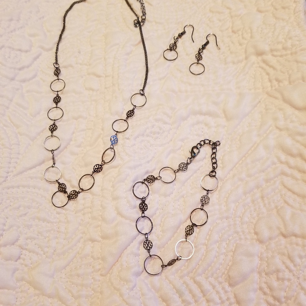 Two sets, necklace, bracelets, earrings.